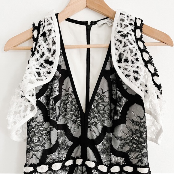 Alexis Emily Black and White Lace Ruffle Cap Sleeve Midi Dress with Side Slit XS - Picture 8 of 16